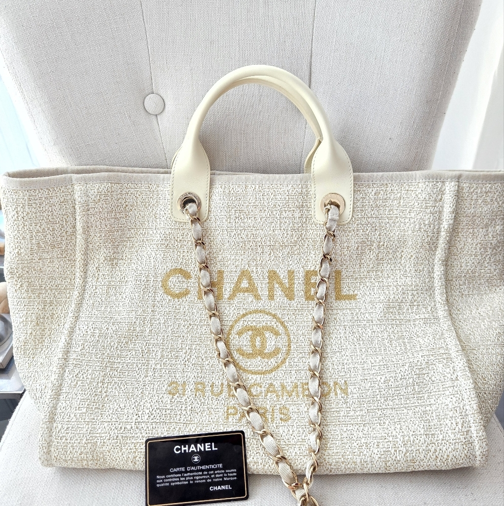 CHANEL canvas beige white tote. Beautiful Condition with authenticity card.